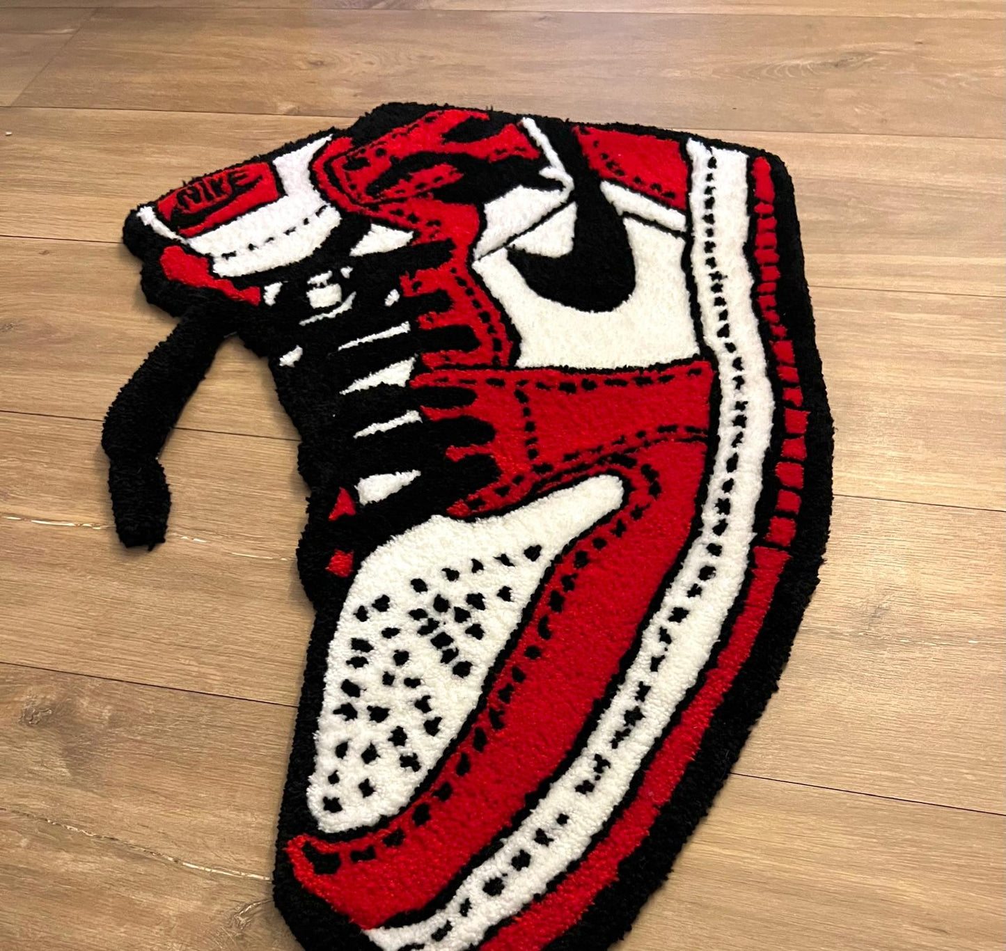Nike red shoe rug